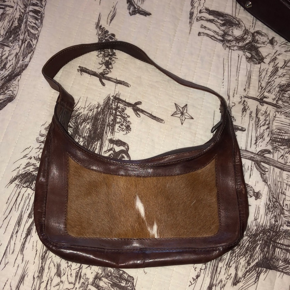 Cowhide clutch shoulder bag